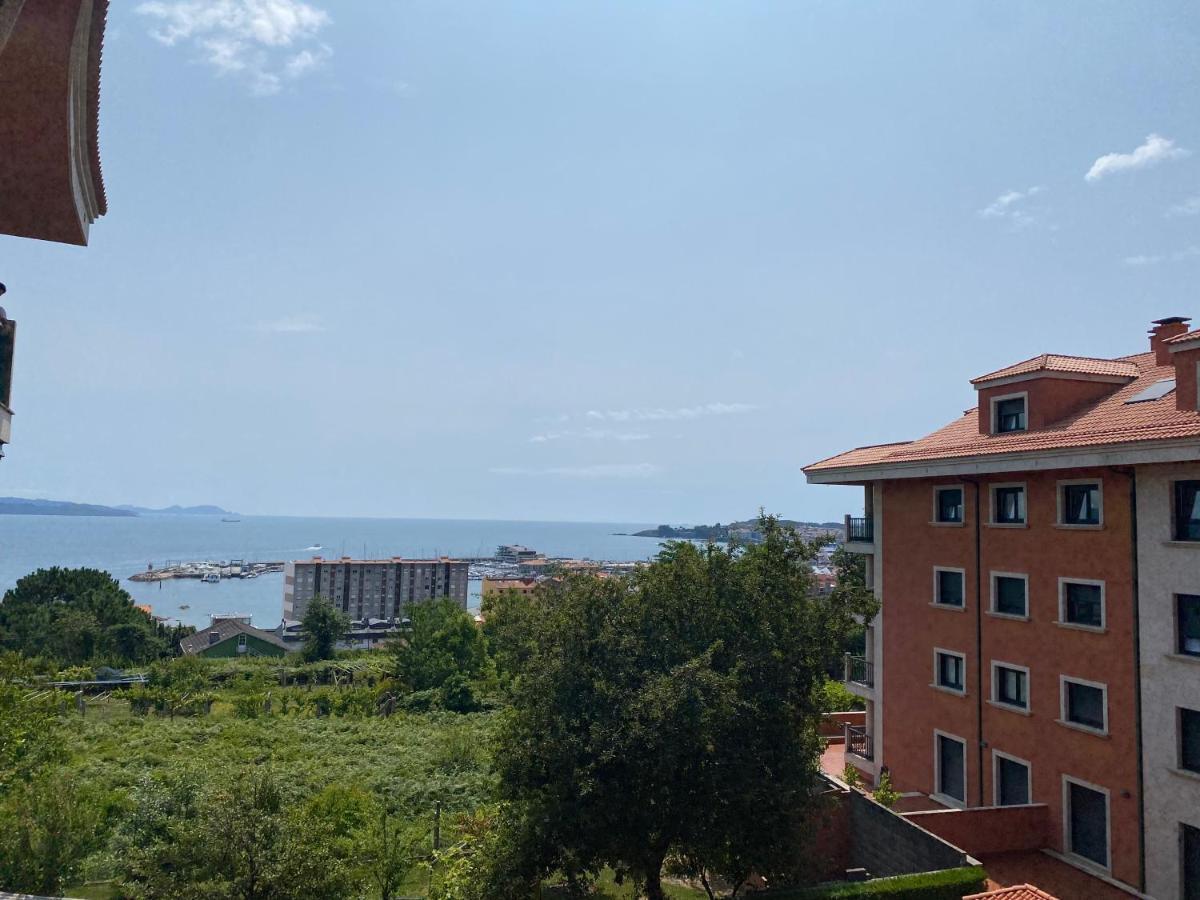 Apartamento Apartamento con vistas al mar, piscina y parking Sanxenxo Exterior foto